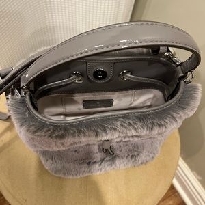 Kate Spade faux fur bag with cross body strap.